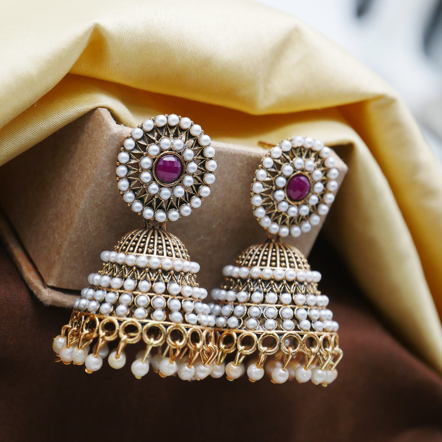 Artificial Earrings for Girls: White Pearl Jhumka Earrings