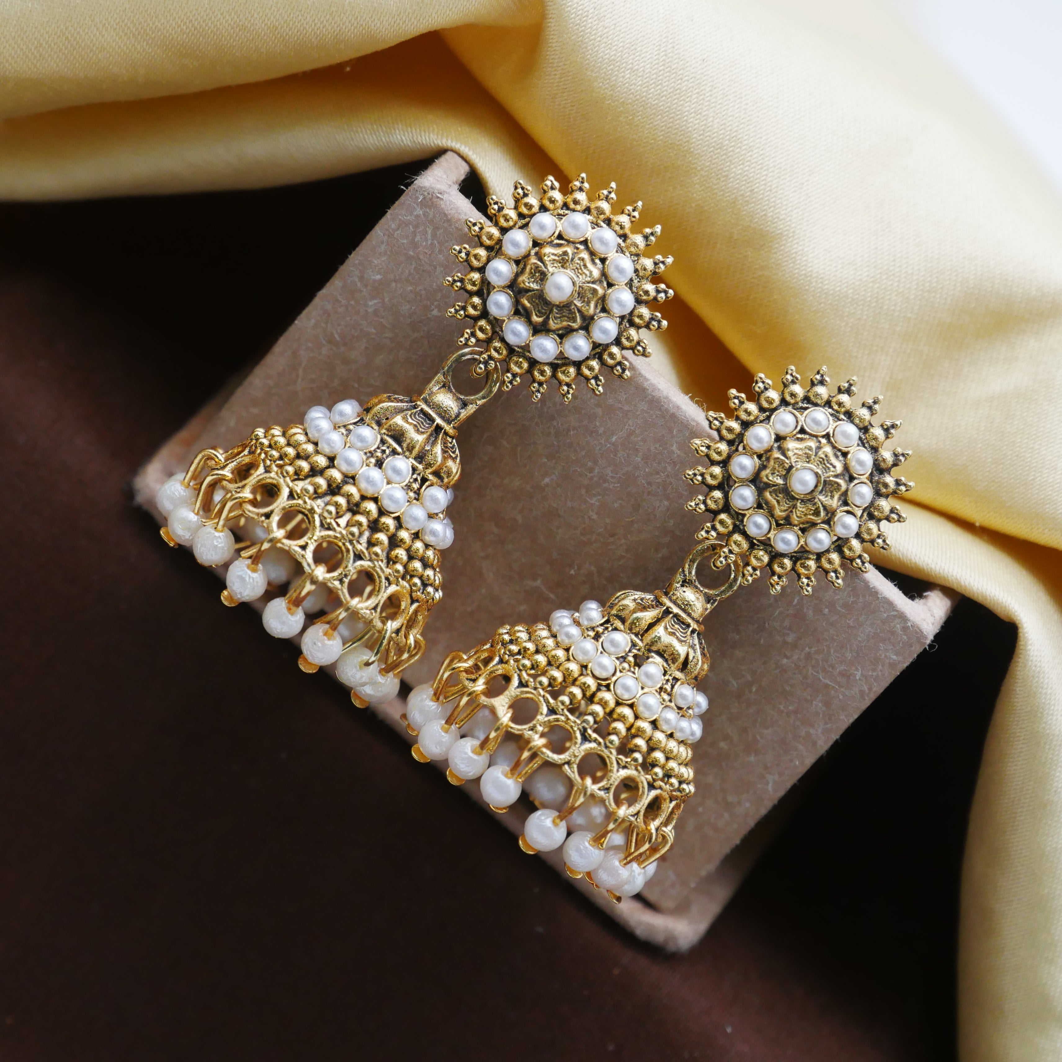 Antique Gold Oxidised White Pearl Jhumka Earrings.