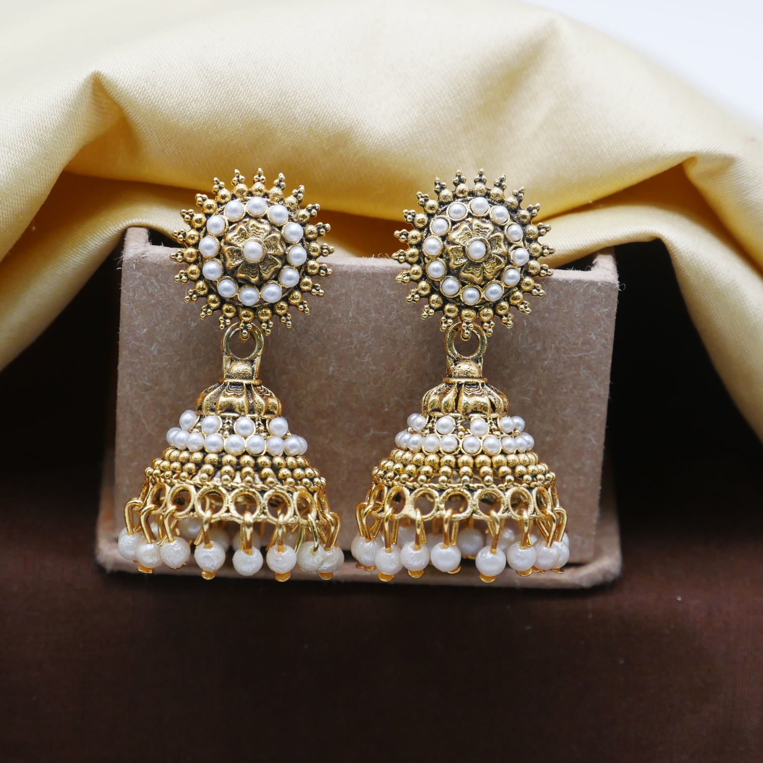 Antique Gold Oxidised White Pearl Jhumka Earrings.