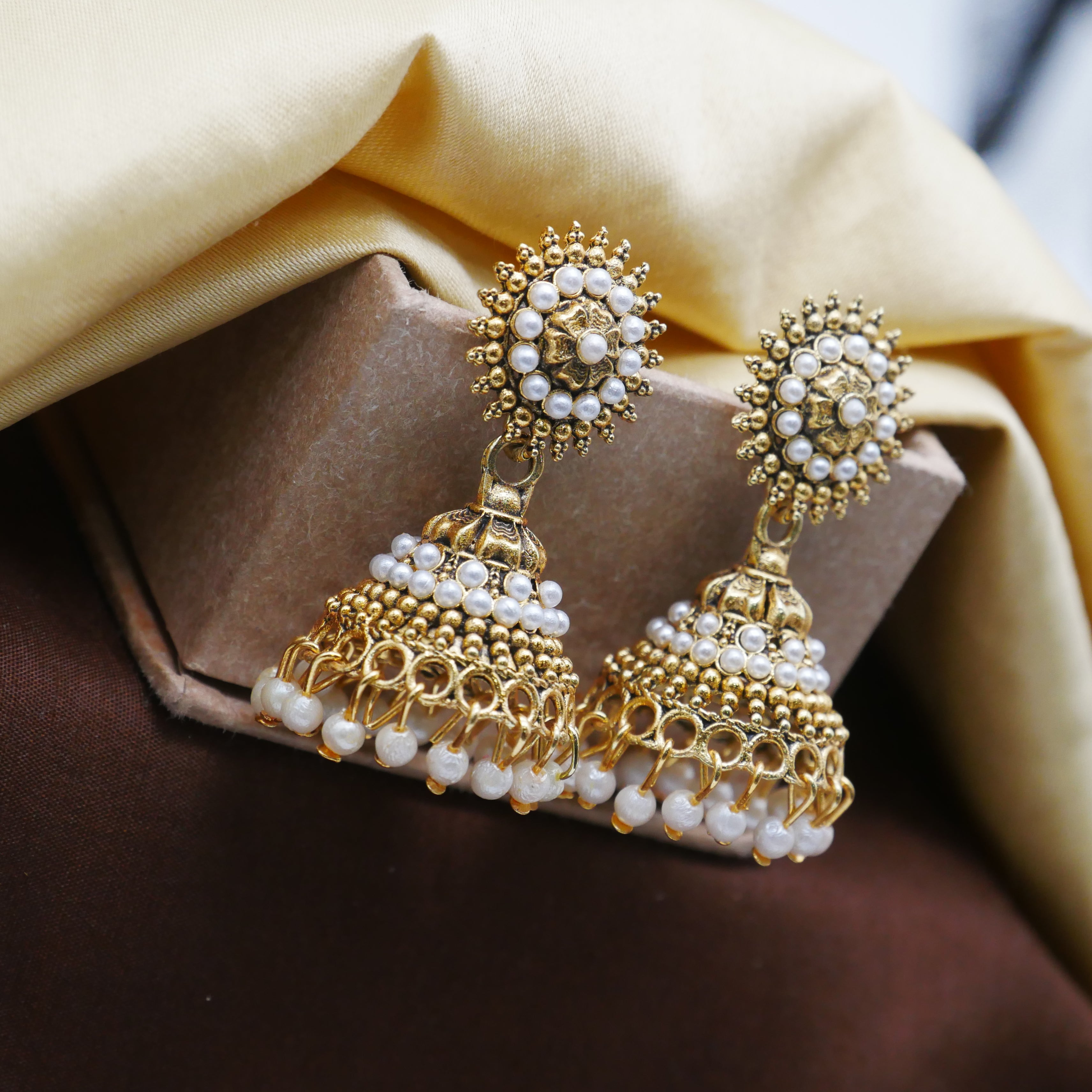 Antique Gold Oxidised White Pearl Jhumka Earrings.