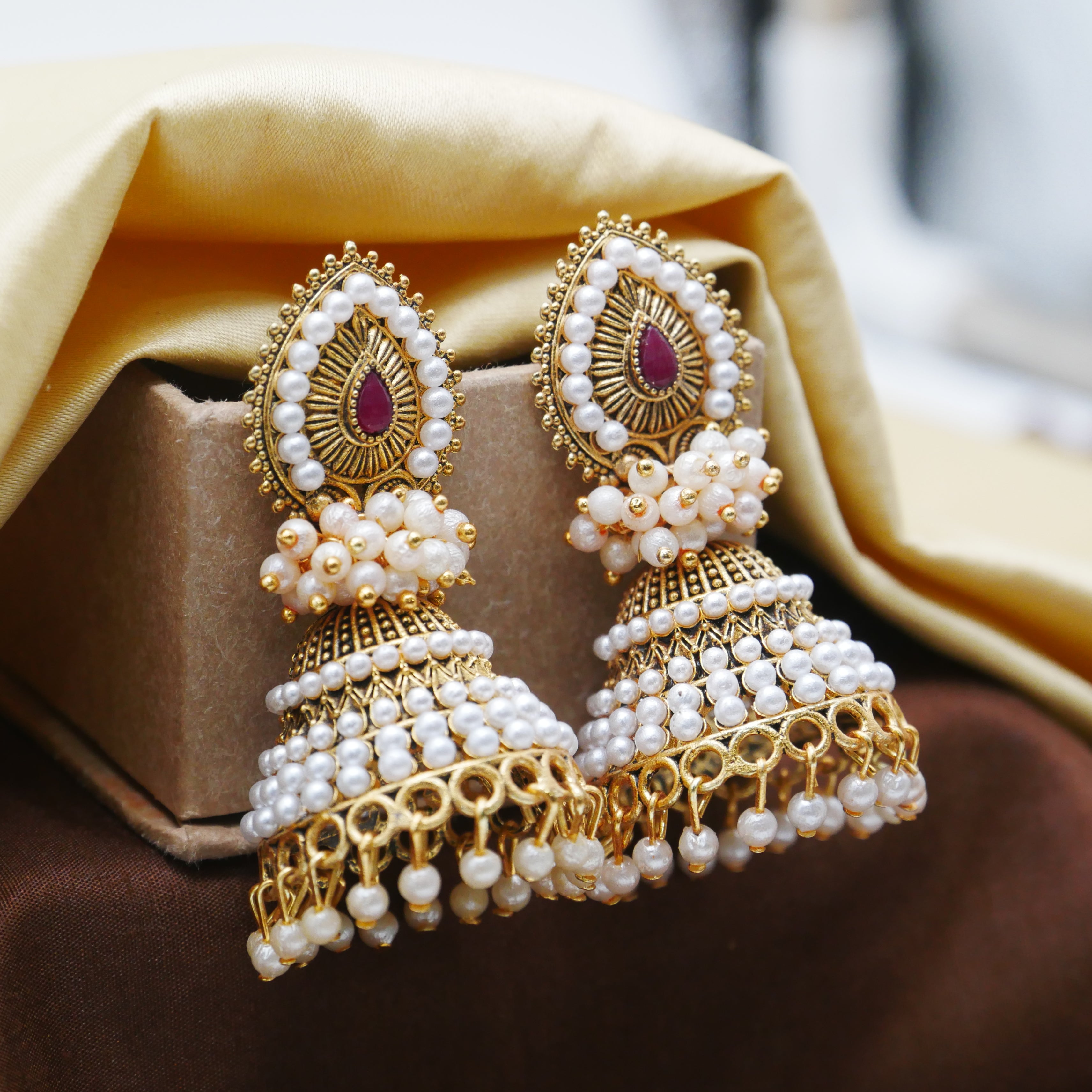 Antique Gold Oxidised White Pearl Jhumka Earrings.