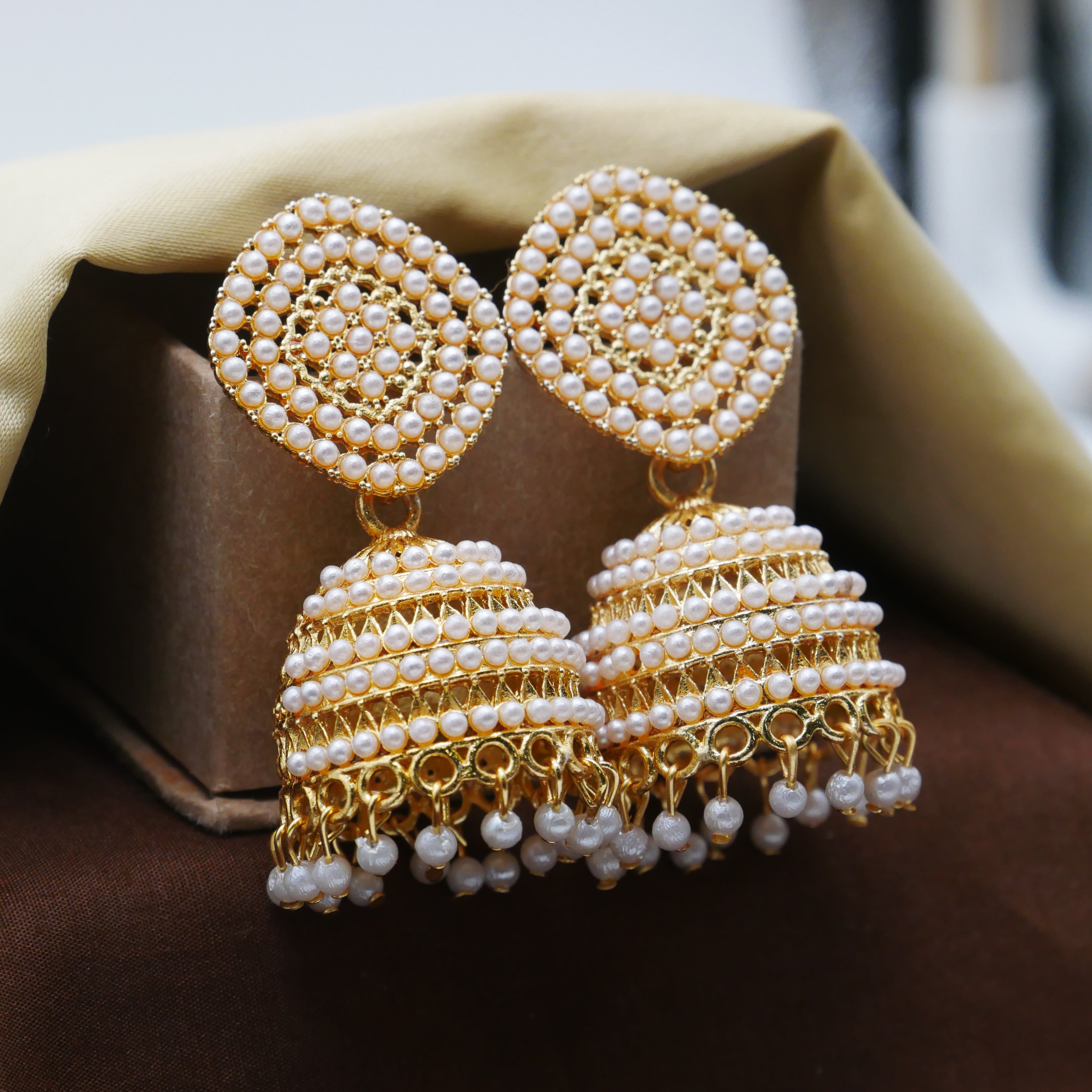 Casual Earrings for Girls: White Pearl Jhumka Earrings.